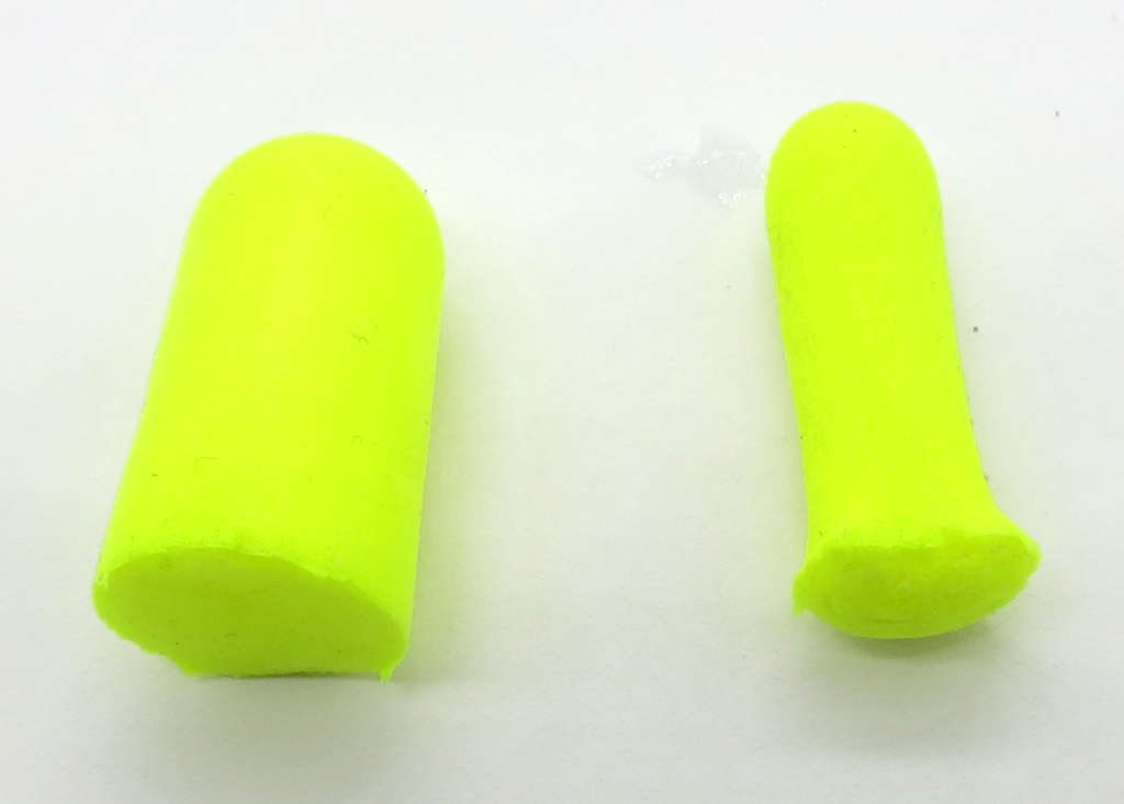 Foam earplugs rolled with Oto Ease