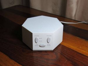White-noise-machine-on-night-stand